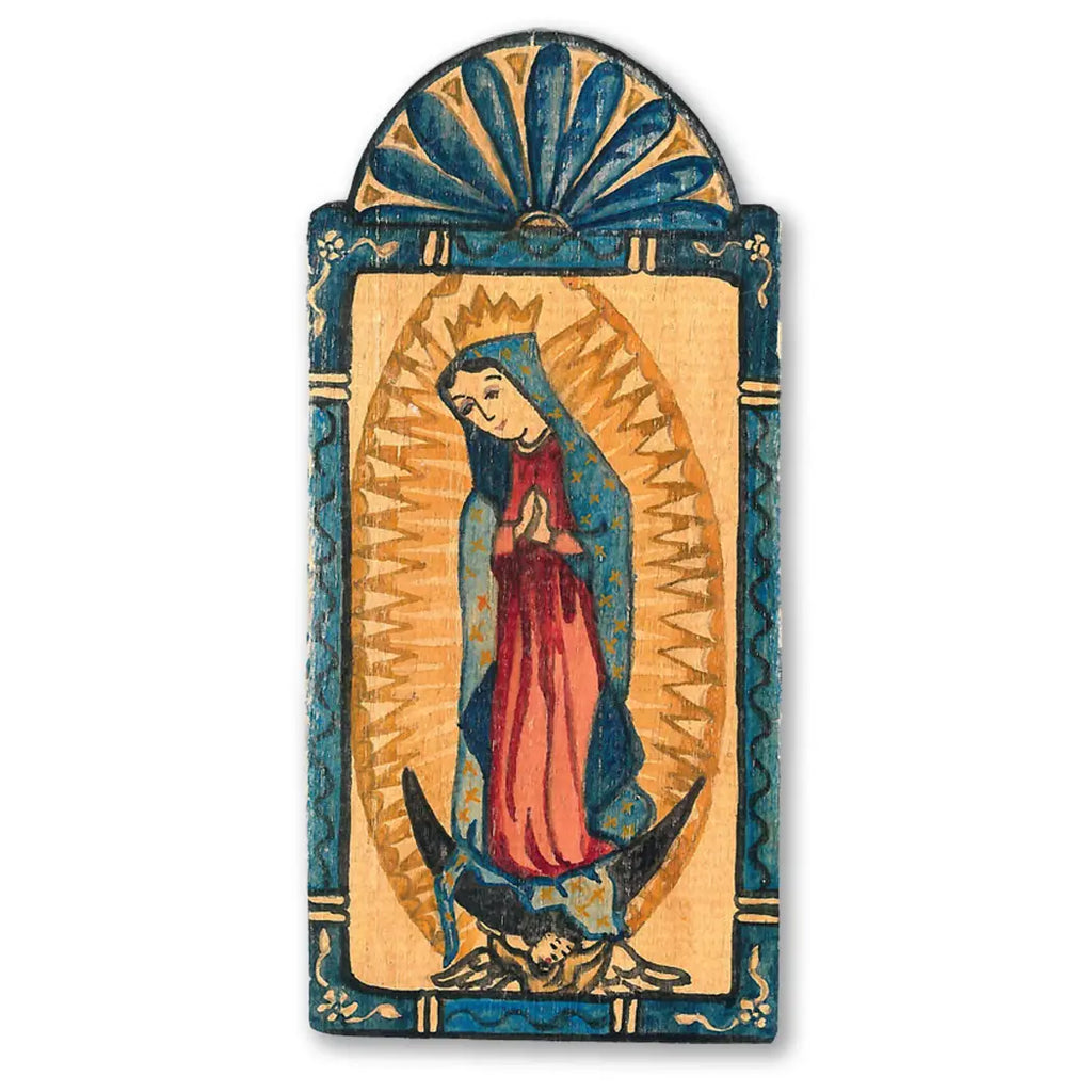 A pocket-sized religious retablo featuring the image of Our Lady of Guadalupe with a blue and gold background, a symbolic representation in a stylized form.