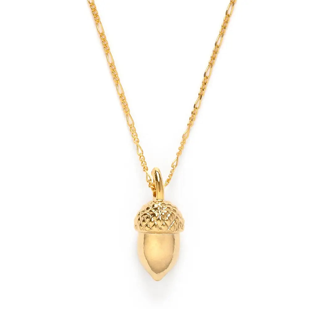 Gold acorn pendant necklace on a white background