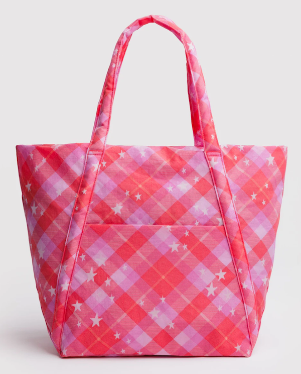 Pink checkered tote bag with star pattern on a light gray background