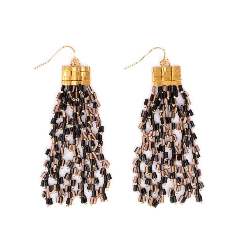 Pair of beaded earrings with gold and black accents on a white background