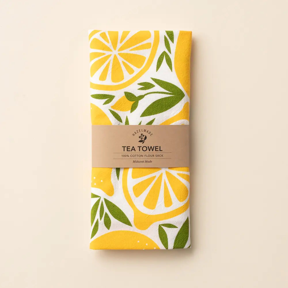 Tea towel with lemon pattern on a beige background