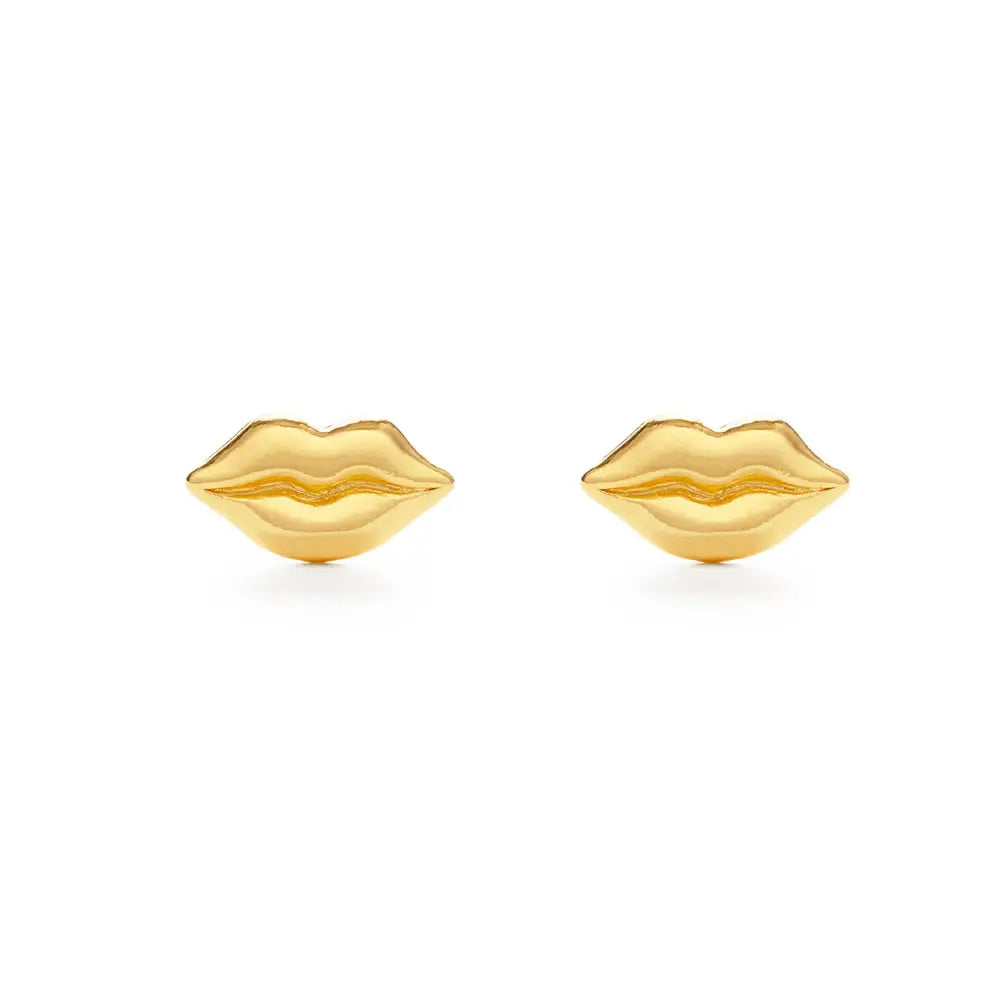 Gold lip-shaped earrings on a white background