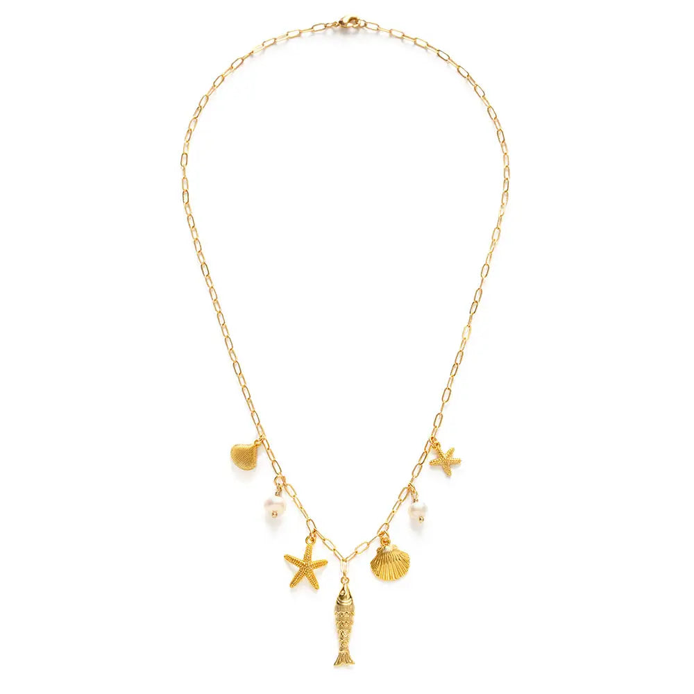 Gold necklace with various charms on a white background