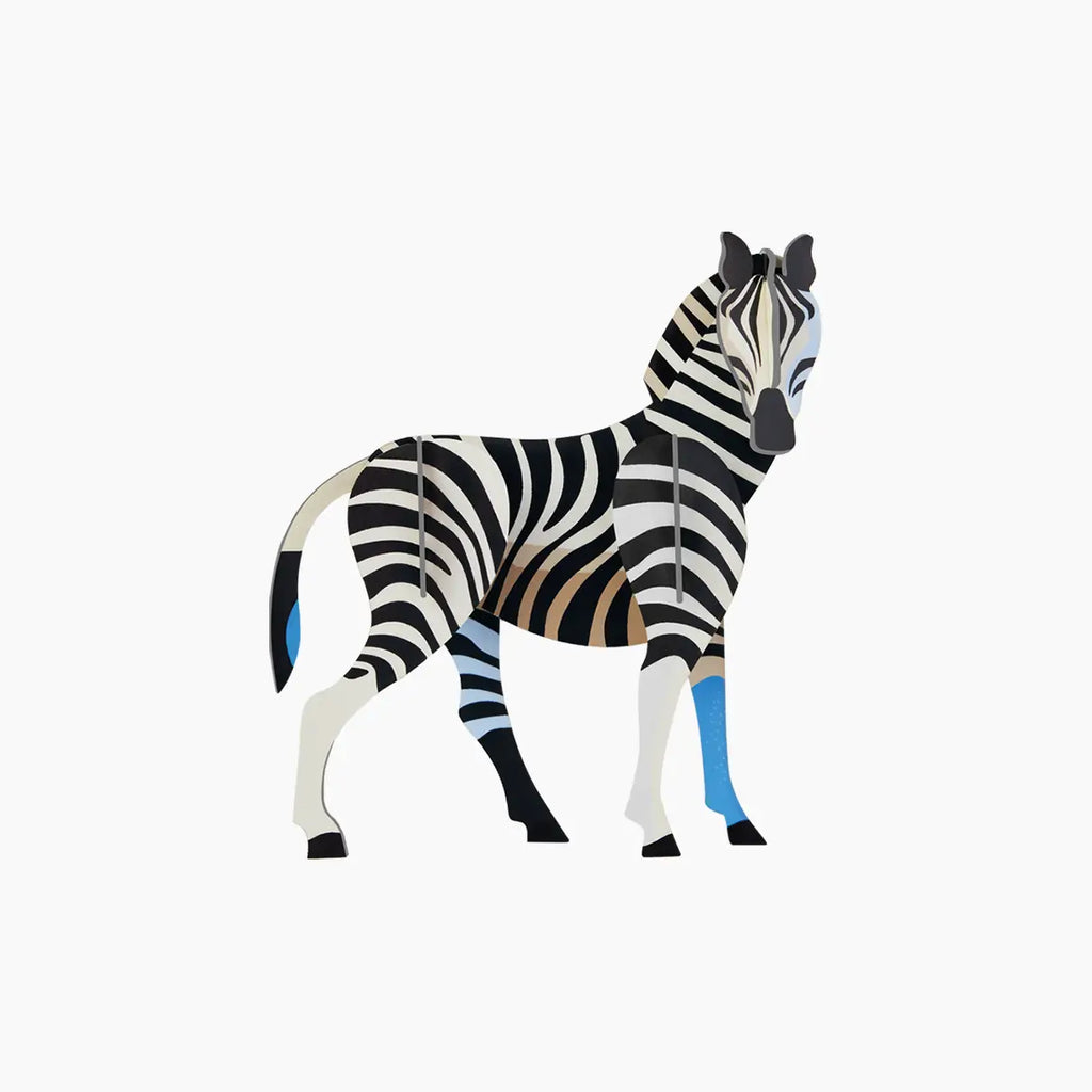 Toy Zebra with black, white, and blue stripes on a white background